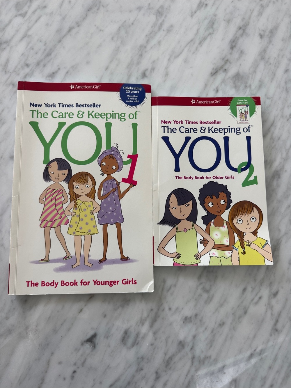 American Girl The Care & Keeping of You Books 1 and 2.